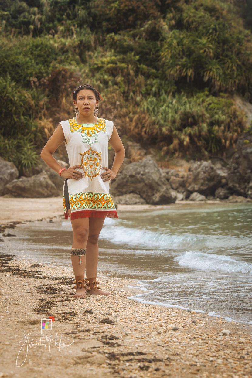 Citlali Gonzalez Trujillo Rios standing in traditional clothing on the beach