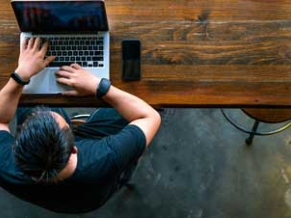 man working on a laptop