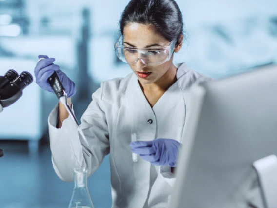 Woman using a chemistry tools