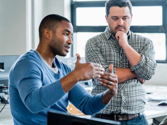 man explaining with his hands