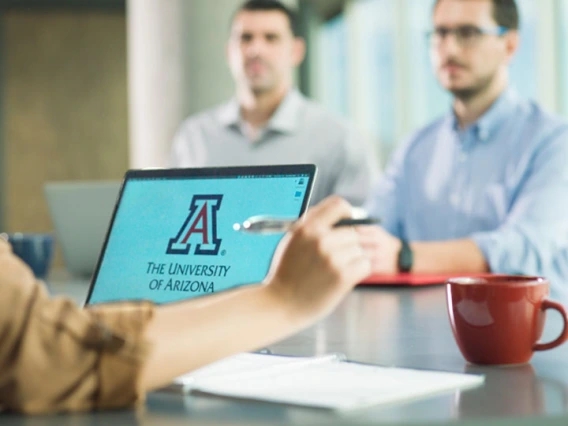 Laptop with University of Arizona logo displayed