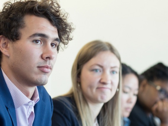 students sitting in a row 