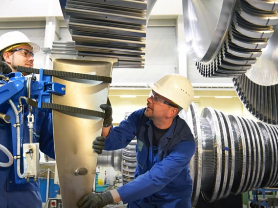 two engineers working on machinery