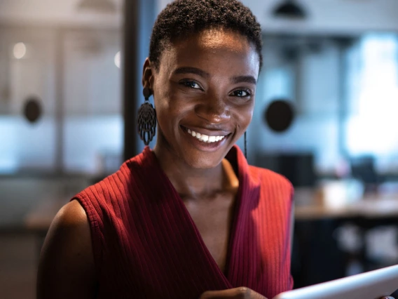 Smiling woman with Tablet