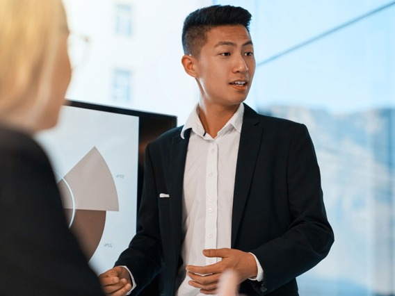 man giving presentation to group