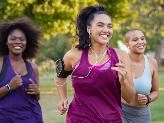 three women running outdoors