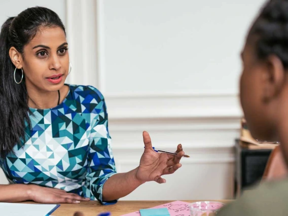 women discussing a financial plan