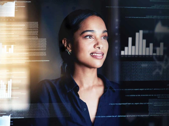 woman looking at data on a screen