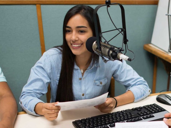 Journalist recording a news podcast