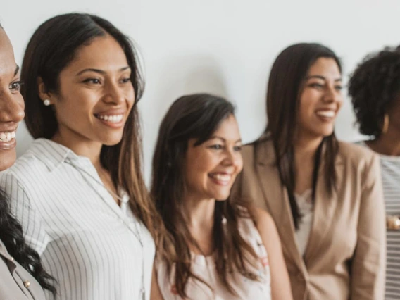 women lined up for a photo