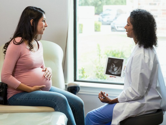 Pregnant Woman consults Doctor about ultrasound