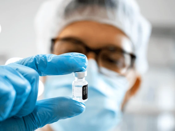 Pharmaceutical scientist working with specimens in a medical lab 