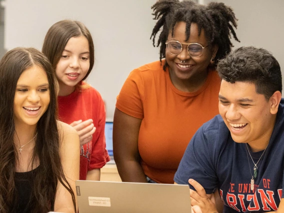 UArizona students working on a project in a science lab