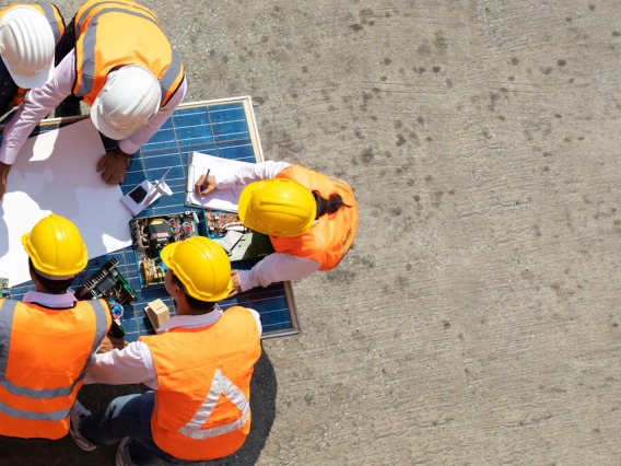 Engineers working on a construction plan