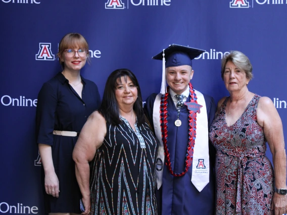 Graduating student with relatives