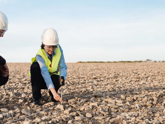 Workers surveying mineral beds