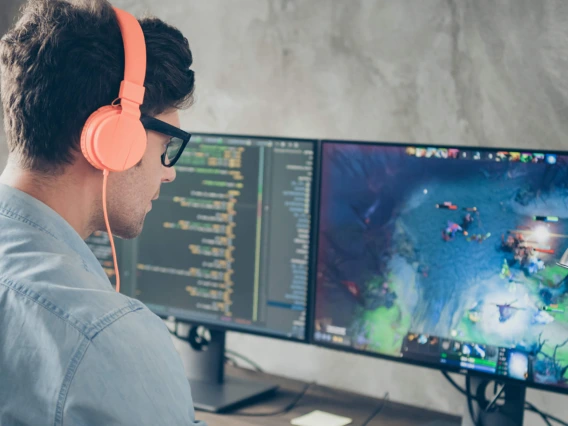 Game designer working with design software