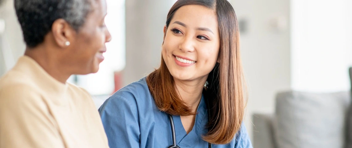 Nurse talking to patient