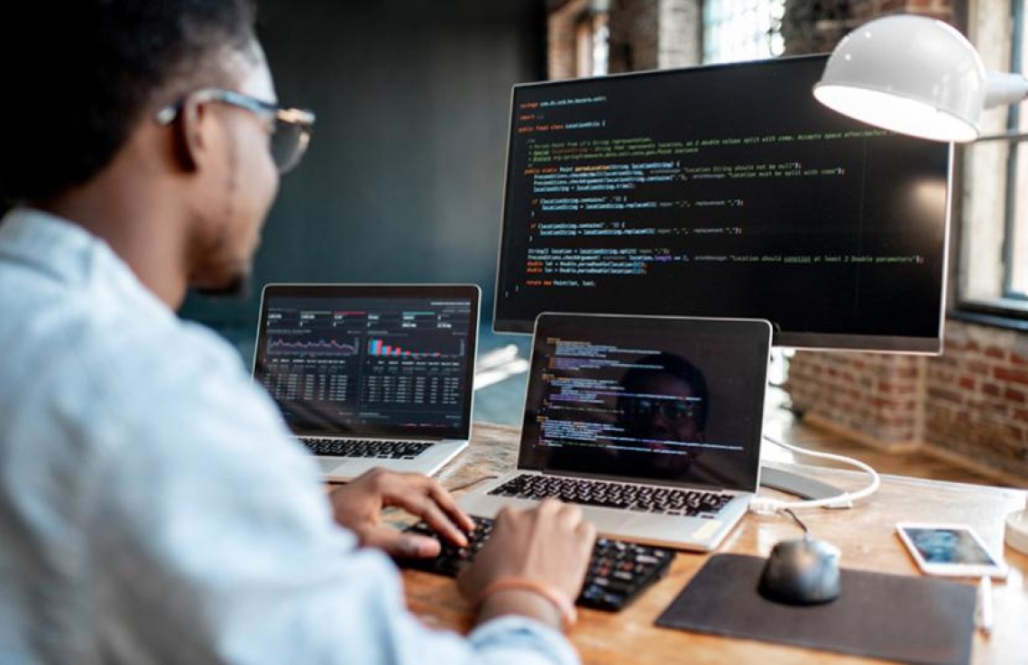 A man working with computers