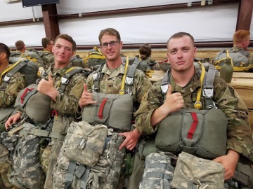 Nathan Madak pictured center with two other Navy vets