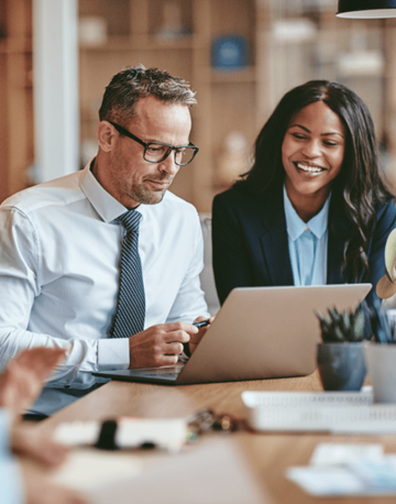 Financial analysts collaborating on a project