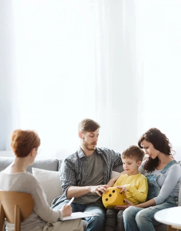 Counselor working with a family