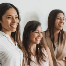 women lined up for a photo