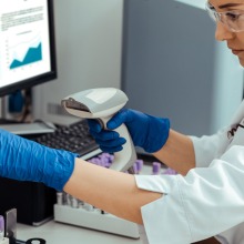 Medical technician working with test tubes