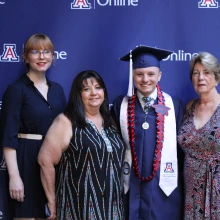 Graduating student with relatives