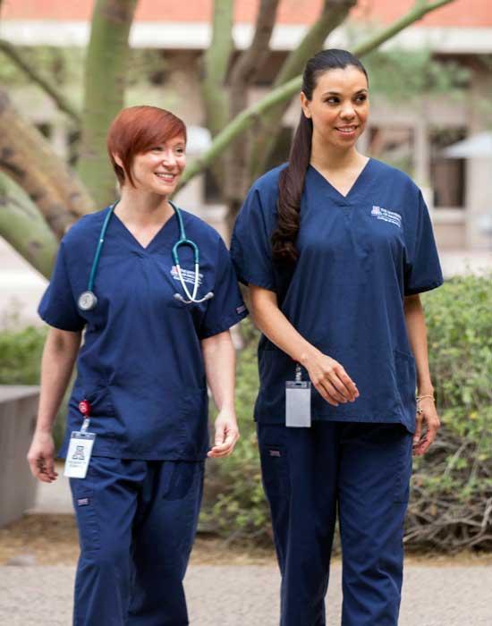 two nurses walking