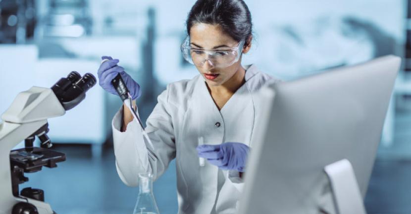 Woman using a chemistry tools